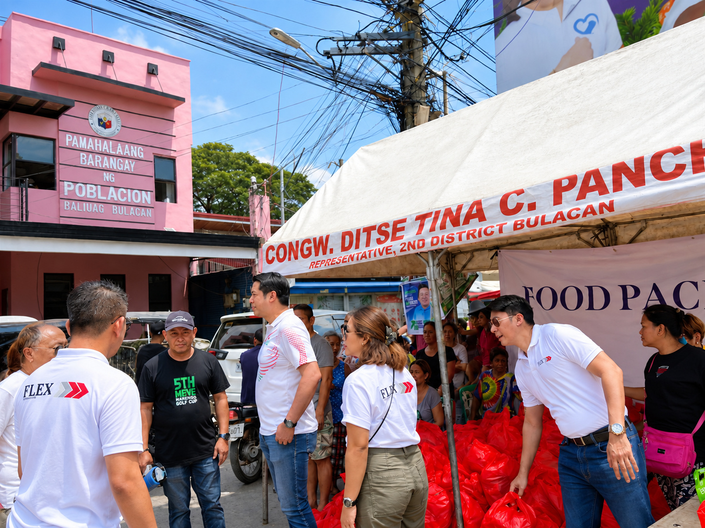 Flex team members coordinating with local barangay leadership on-site